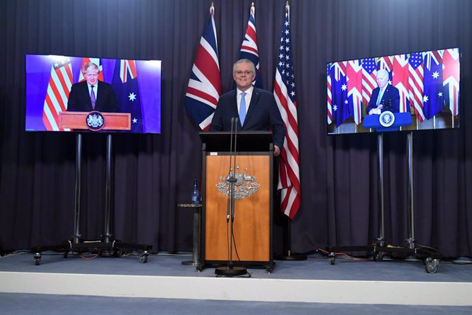 Britains Prime Minister Boris Johnson, Australias Prime Minister Scott Morrison and US President Joe Biden at a joint press conference via AVL from The Blue Room at Parliament House in Canberra, Thursday, September 16, 2021. (AAP Image/Mick Tsikas) NO