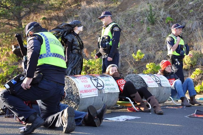 A supplied image shows protesters blockading a fuel terminal in Hobart, Thursday, August 19, 2021. Protesters across Australia have taken to blocking fuel terminals in response to the latest report by the Intergovernmental Panel on Climate Change, detai