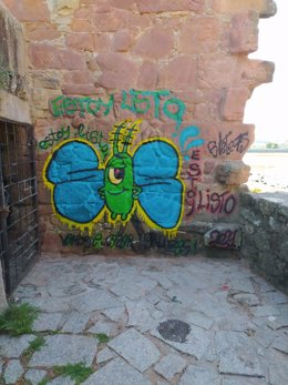 Grafiti realizado en el molino de mareas