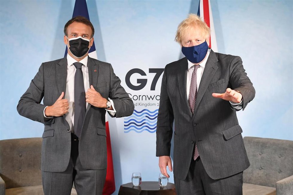 Archivo - Emmanuel Macron y Boris Johnson