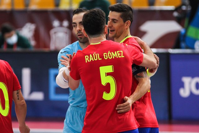 Jesus Herrero of Spain, Raul Gomez of Spain and Carlos Ortiz of Spain celebrate a goal during Eurocup qualification futsal match played between Spain and Latvia at Ciudad del Futbol on December 08, 2020 in Las Rozas, Madrid, Spain.