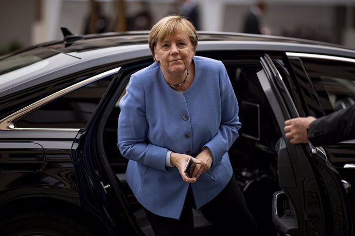 27 September 2021, Berlin: German Chancellor Angela Merkel arrives to attend the St. Michael Annual Reception 2021 of the German Bishops' Conference. Photo: Fabian Sommer/dpa