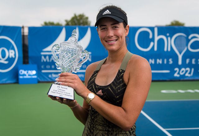 Garbine Muguruza of Spain poses with the champions trophy after winning the final of the 2021 Chicago Fall Tennis Classic WTA 500 tennis tournament