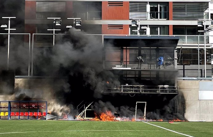08 October 2021, Andorra, Andorra la Vella: A fire breaks out at Estadi Nacional after the television gantry at the side of the 3300-seater stadium was engulfed in flames three hours after England had trained ahead of Saturday's FIFA 2022 World Cup Euro