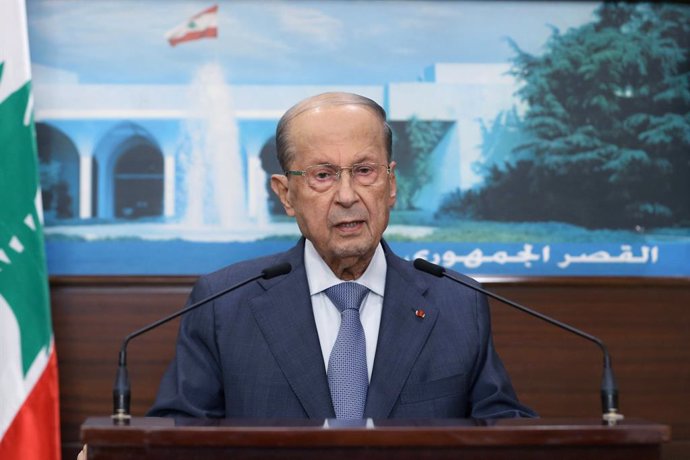 HANDOUT - 14 October 2021, Lebanon, Baabda: Lebanese President Michel Aoun gives a televised address from the Presidential Palace in Baabda. At least six people were killed and 32 others were injured in Beirut today in gunfire and clashes at a protest a