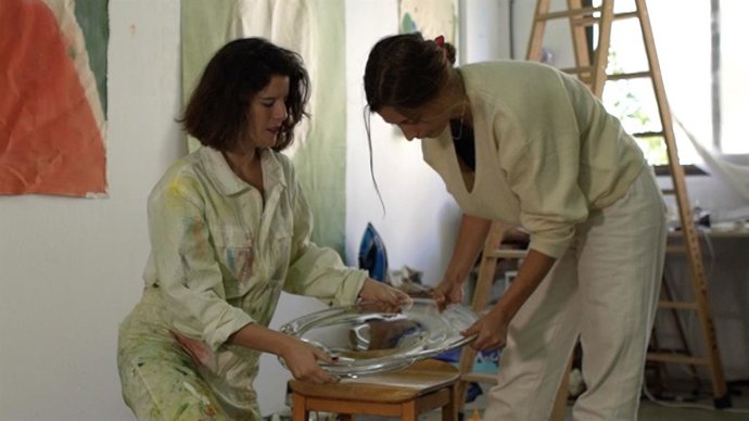 Artists Violeta Maya and Persiis Hajiyanni prepare to unveil an experiential art installation commissioned by Martin Millers Gin for The Affordable Art Fair