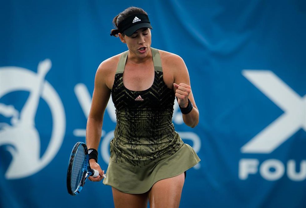 Garbiñe Muguruza celebrando un punto durante un torneo