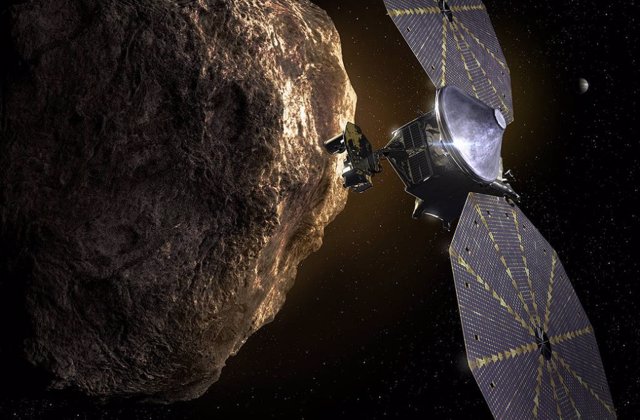 Ilustración de la misión Lucy junto a un asteroide