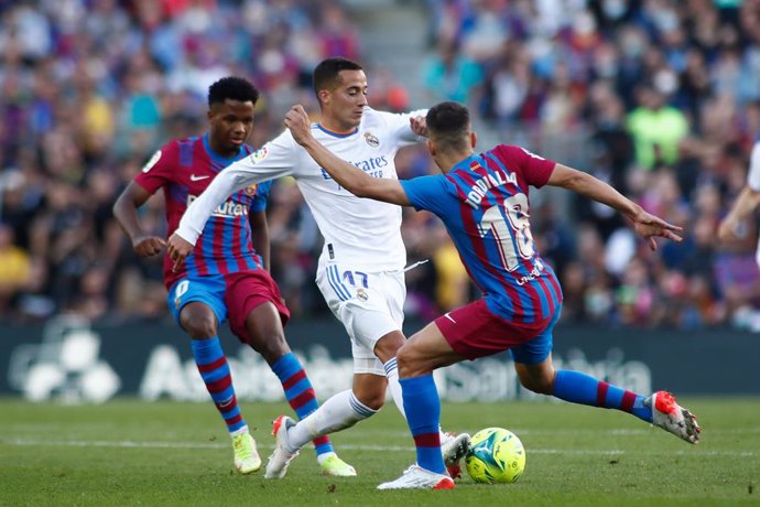 Lucas Vazquez of Real Madrid and Jordi Alba of FC Barcelona in action during the spanish league, La Liga Santander, football match played between FC Barcelona and Real Madrid at Camp Nou stadium on October 24, 2021, in Barcelona, Spain.