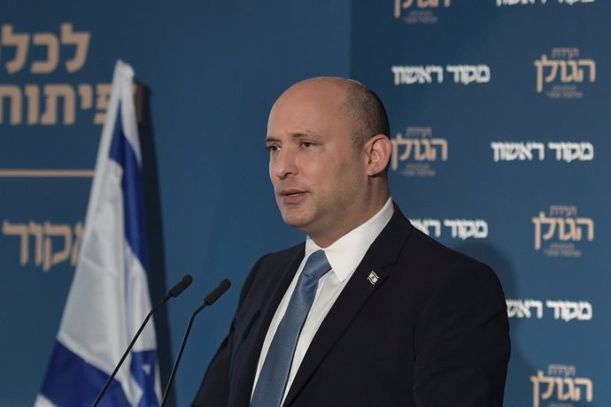 HANDOUT - 11 October 2021, ---, Golan Heights: Israeli Prime minister Naftali Bennett speaks during a conference held by Makor Rishon newspaper on Golan Heights Economic and Regional Development, in the Israel-annexed Golan Heights. Photo: Koby Gideon/G
