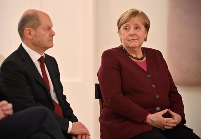 Olaf Scholz y Angela Merkel