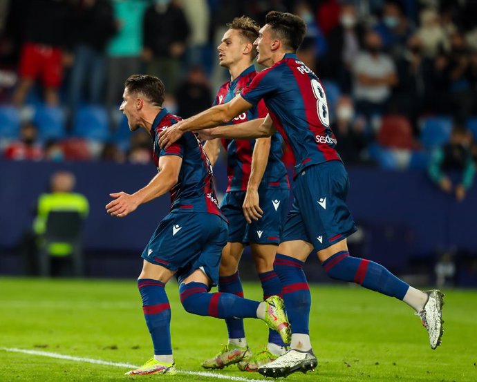 Enis Bardhi of Levante UD celebrates a goal with teammates during the Santander League match between Levante UD and Atletico de Madrid at the Ciutat de Valencia Stadium on October 28, 2021, in Valencia, Spain.