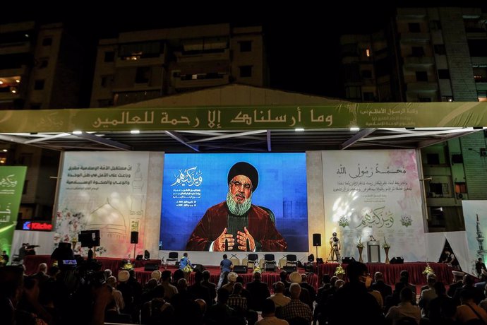 22 October 2021, Lebanon, Beirut: Hezbollah supporters take part in a mass rally in Beirut's southern suburb, as Secretary-General of Lebanon's Iran-allied Hezbollah movement, Hassan Nasrallah is delivering a televised speech to mark the birth of Islam'