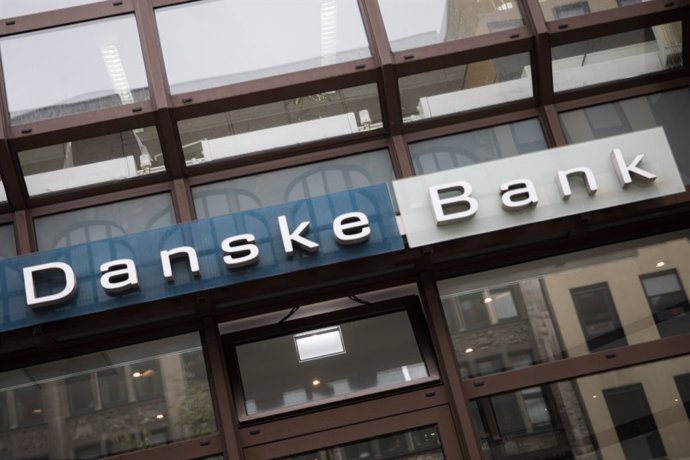 Archivo - FILED - 26 October 2018, Hamburg: A Danske Bank logo can be seen on a building with a branch of the Danish bank. Danske Bank, Denmark's largest lender, reported roughly unchanged net profit for 2019, which was 15.1 billion kroner (2.2 billion 