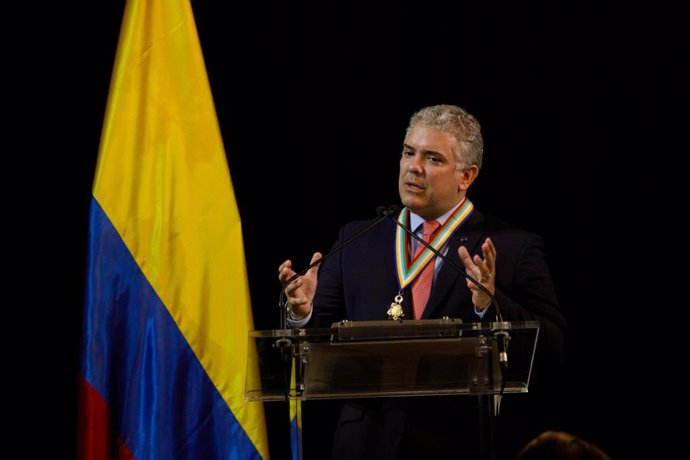 13 October 2021, Colombia, Bogota: Colombian President Ivan Duque delivers remarks after being awarded the gold medal by the Americas Society/Council of the Americas for actions he has taken in the reception and regulation of Venezuelan migrants. Photo: