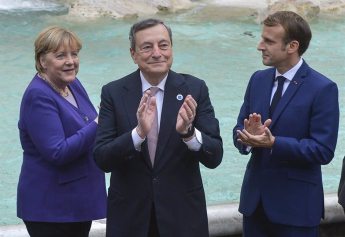 Italy, Rome- October 31, 2021.G20 summit in Rome.  Short walk of the leaders by the Fontana di Trevi..Angela Merkel, Mario Draghi  and Emmanuel Macron