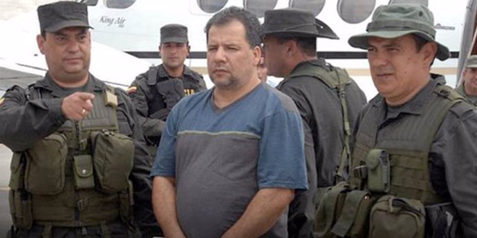 Archivo -    El presidente de colombia, Juan Manuel Santos, ha anunciado que este jueves firmará la extradición del narcotraficante, exjefe paramilitar y presunto creador del Clan del Golgo, Daniel Rendón, alias 'Don Mario'