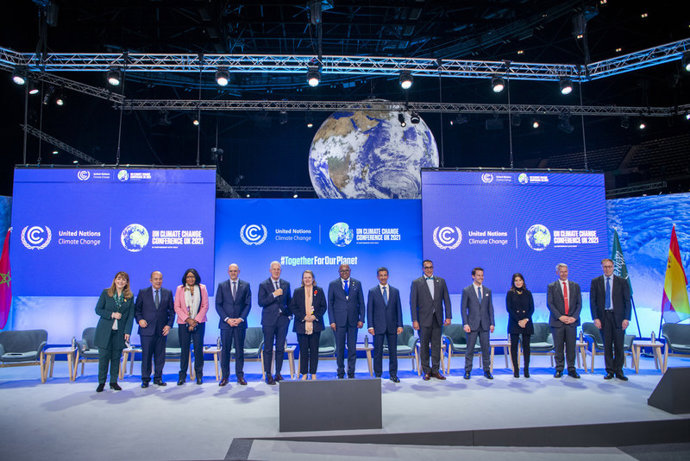 Global tourism leaders on a panel at COP 26 to discuss the New Sustainable Tourism Global Center (STGC) commitment to achieving net-zero emissions