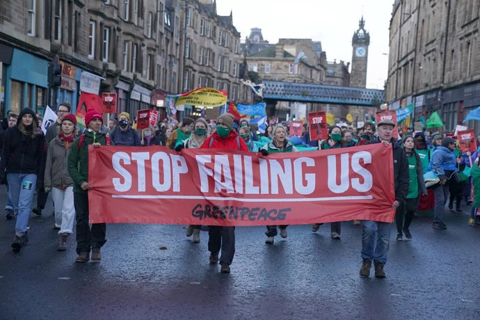06 November 2021, United Kingdom, Glasgow: Protesters take part in a rally organised by the Cop26 Coalition in Glasgow demanding global climate justice. Photo: Andrew Milligan/PA Wire/dpa