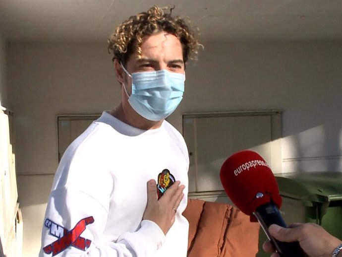 DAVID BISBAL SALIENDO DE CASA JUNTO A ROSANNA ZANETTI