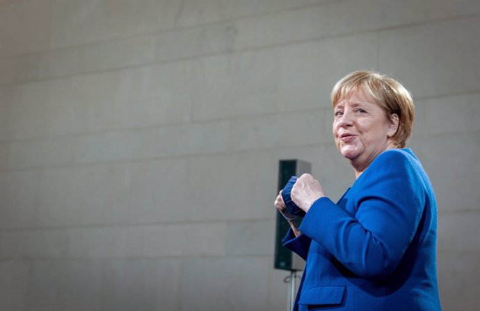 10 November 2021, Berlin: German Chancellor Angela Merkel is pictured after the handover of the annual report of the German Council of Economic Experts ("Wirtschaftsweise"). Photo: Kay Nietfeld/dpa-Pool/dpa