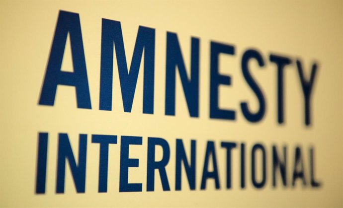 Archivo - FILED - 09 December 2011, Berlin: The logo of the human rights organization Amnesty International is pictured in Berlin.  The human rights organization Amnesty International on Thursday called on the international community to do more to halt 