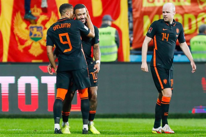 Memphis Depay of the Netherlands celebrates after scoring his sides second goal with teammates during the FIFA World Cup 2022, Qualifiers Group G football match between Montenegro and Netherlands on November 13, 2021 at Gradski Stadion Podgorica in Podg