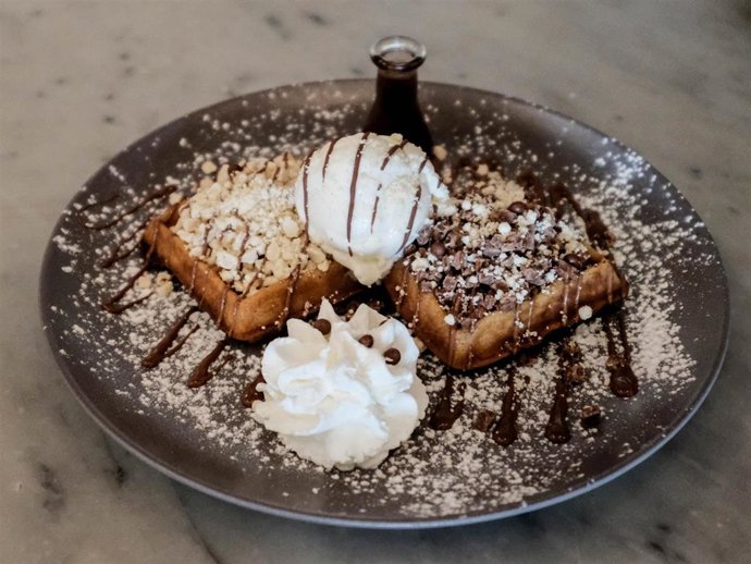 A chocolate chip and nougat waffle is prepared at the Max Brenner Chocolate Bar at the Tel Aviv Port on World Chocolate Day 2020 which celebrates the consumption of chocolate worldwide