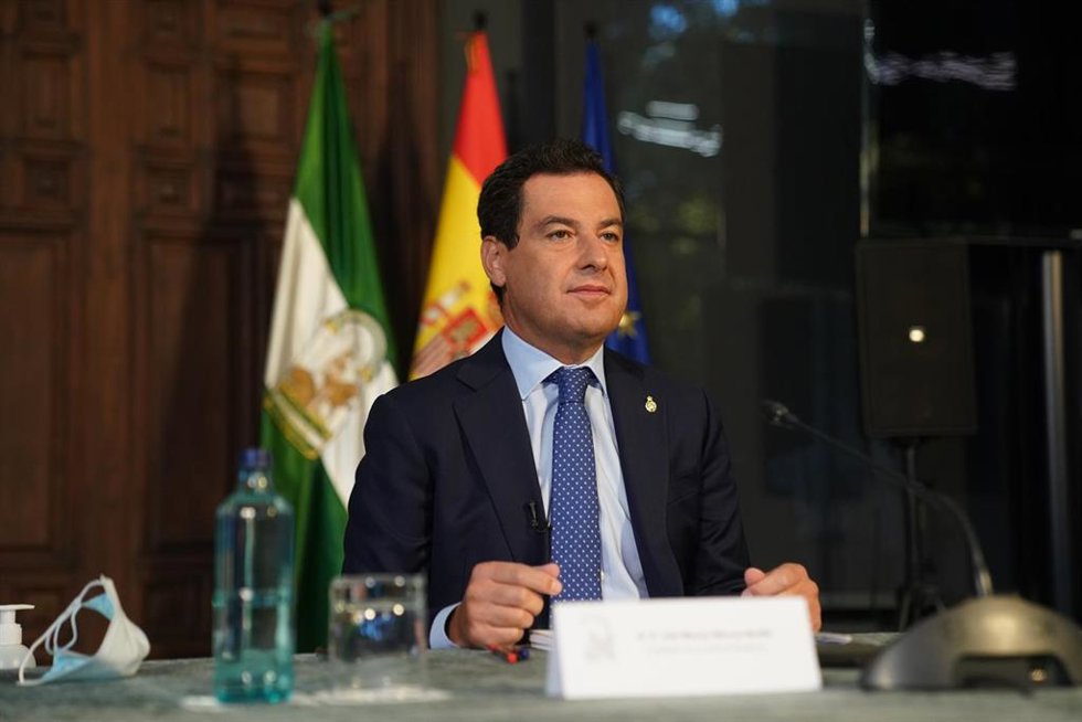 Archivo - El presidente de la Junta de Andalucía Juanma Moreno, en una foto de archivo de una intervención de forma telemática ante el pleno del Comité Europeo de las Regiones en el debate del Pacto Verde. 