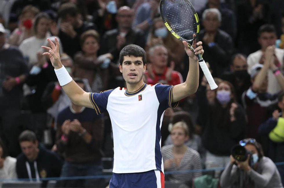 Carlos Alcaraz of Spain celebrates his first round victory over Pierre-Hughes Herbert of France during day 2 of the Rolex Paris Masters 2021.