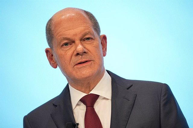24 November 2021, Berlin: Olaf Scholz, candidate of the Social Democratic Party (SPD) for German Chancellor and acting Minister of Finance, speaks at a press conference to present the joint coalition agreement of the traffic light parties of SPD, the Gree