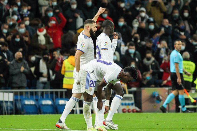 Karim Benzema of Real Madrid celebrates a goal with teammates during La liga football match played between Real Madrid and Athletic de Bilbao at Santiago Bernabeu stadium on December 1, 2021, in Madrid, Spain.
