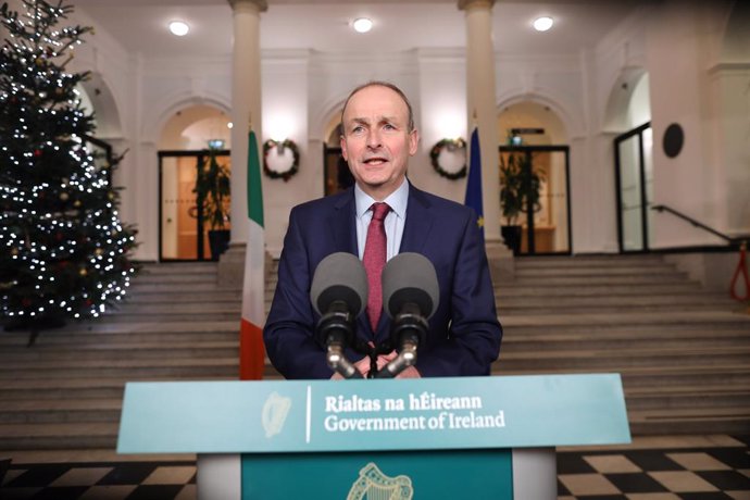 03 December 2021, Ireland, Dublin: Irish Prime Minister Michael Martin addresses the nation at Government Buildings to give updates about Coronavirus (Covid-19) restrictions. Photo: Julien Behal/PA Media/dpa