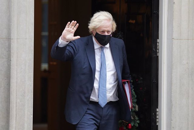 08 December 2021, United Kingdom, London: UK Prime Minister Boris Johnson leaves 10 Downing Street to attend the Prime Minister's Questions at the Houses of Parliament. Photo: Stefan Rousseau/PA Wire/dpa