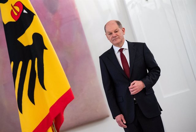 08 December 2021, Berlin: German Chancellor Olaf Scholz (SPD), stands during the presentation of the certificates of appointment to the members of the new German government at the Bellevue Palace. Photo: Bernd Von Jutrczenka/dpa