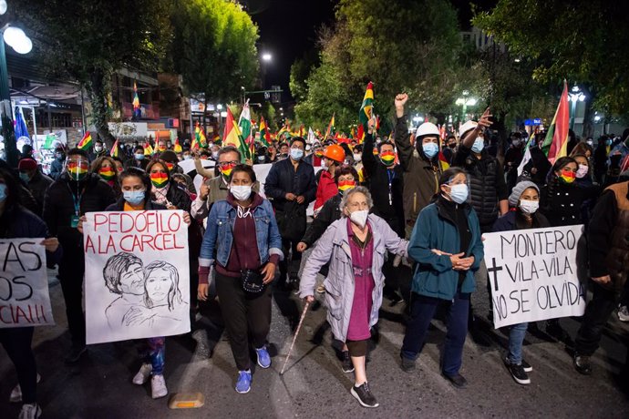 Archivo - 15 March 2021, Bolivia, La Paz: Hundreds of demonstrators take part in a protest against the arrest of former interim president Jeanine Anez, several of her ministers, and high-ranking police and army officers. The politicians were arrested as