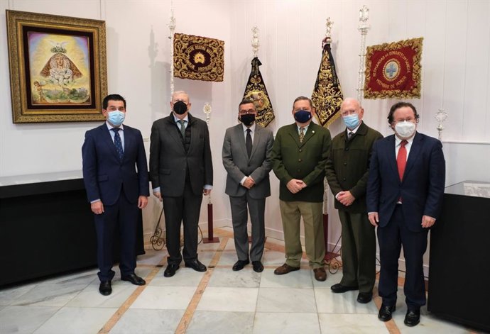 Acto de inauguración oficial de la exposición '100 años en San Benito' en el Círculo Mercantil de Sevilla.