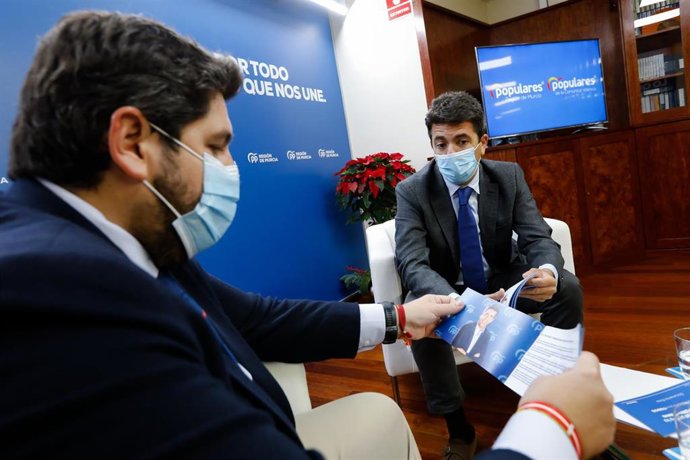 Los presidentes del PP de la Región, Fernando López Miras y Carlos Mazón, reunidos en la sede del PP de Murcia