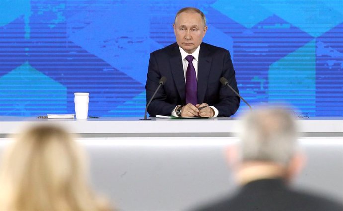 HANDOUT - 23 December 2021, Russia, Moscow: Russian President Vladimir Putin holds his annual End-of-year press conference in Moscow. Photo: -/Kremlin/dpa - ATTENTION: editorial use only and only if the credit mentioned above is referenced in full