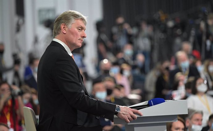 HANDOUT - 23 December 2021, Russia, Moscow: Kremlin spokesman Dmitry Peskov, attends the annual End-of-year press conference of Russian President Vladimir Putin. Photo: -/Kremlin/dpa - ATTENTION: editorial use only and only if the credit mentioned above
