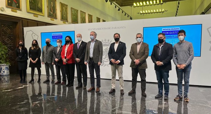 La II edición de la iniciativa solidaria 'Con Gusto' se ha presentado este miércoles en el Ayuntamiento de Zaragoza