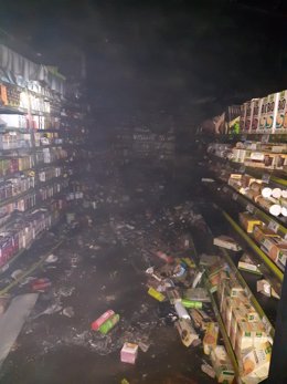 Interior supermercado BM de Laredo incendiado. Se ha abierto una investigación y se han instruido diligencias por robo