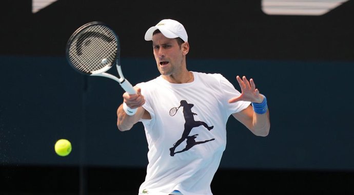 A supplied image of Novak Djokovic of Serbia during a practice session ahead of the Australian Open, Melbourne Park, in Melbourne,  Tuesday, January 11, 2022. (AAP Image/Supplied by Tennis Australia, Scott Barbour) NO ARCHIVING, EDITORIAL USE ONLY