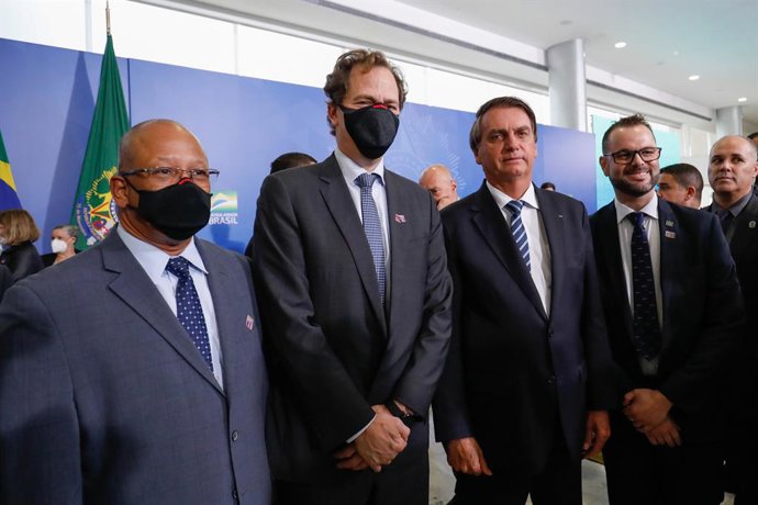 (L-R) Mr. John Lopes, Forever Oceans President, Brazil, Mr. Bill Bien, Forever Oceans CEO, Brazilian President Mr. Jair Bolsonaro, Secretary Of Aquaculture And Fisheries Mr. Jorge Seif Júnior, Attending To An Event At The Palácio Do Planalto, In Brasíli