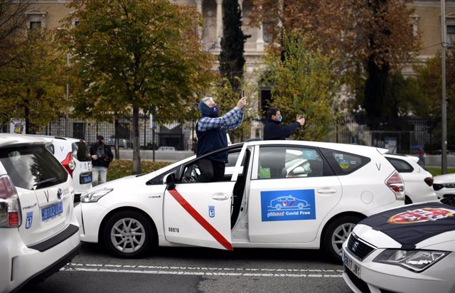 Archivo - Marcha de taxistas convocada por la FPTM, la Asociación Gremial del Taxi de Madrid y la Asociación Élite Taxi Madrid.