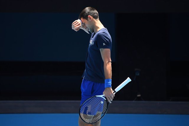 Novak Djokovic of Serbia is seen during a training session at Melbourne Park in Melbourne, Wednesday, January 12, 2022. (AAP Image/James Ross) NO ARCHIVING