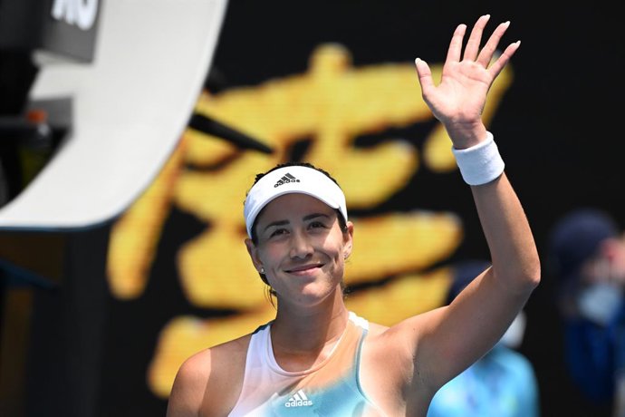 Garbine Muguruza of of Spain celebrates her win over Clara Burel of France during their \ round 1 match on Day 2 of the Australian Open at Melbourne Park, in Melbourne, Tuesday, January 18, 2022. (AAP Image/Dean Lewins) NO ARCHIVING