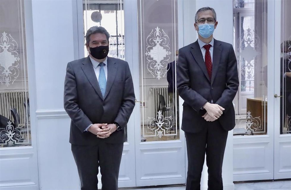 El ministro de Inclusión, José Luis Escrivá, y el gobernador del Banco de España, Pablo Hernández de Cos.