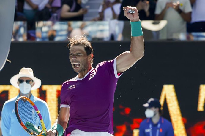 19 January 2022, Australia, Melbourne: Spanish tennis player Rafael Nadal celebrates after winning his Second Round Men's Singles tennis match against Germany's Yannick Hanfmann on Day 3 of the 2022 Australian Open at Melbourne Park. Photo: Frank Molter