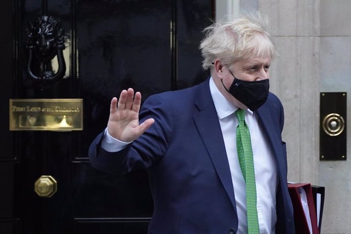 19 January 2022, United Kingdom, London: UK Prime Minister Boris Johnson leaves 10 Downing Street, London, to attend Prime Minister's Questions at the Houses of Parliament. Photo: Stefan Rousseau/PA Wire/dpa